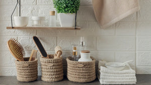 Sustainable bathroom ideas – wicker baskets used to hold bathroom products 
